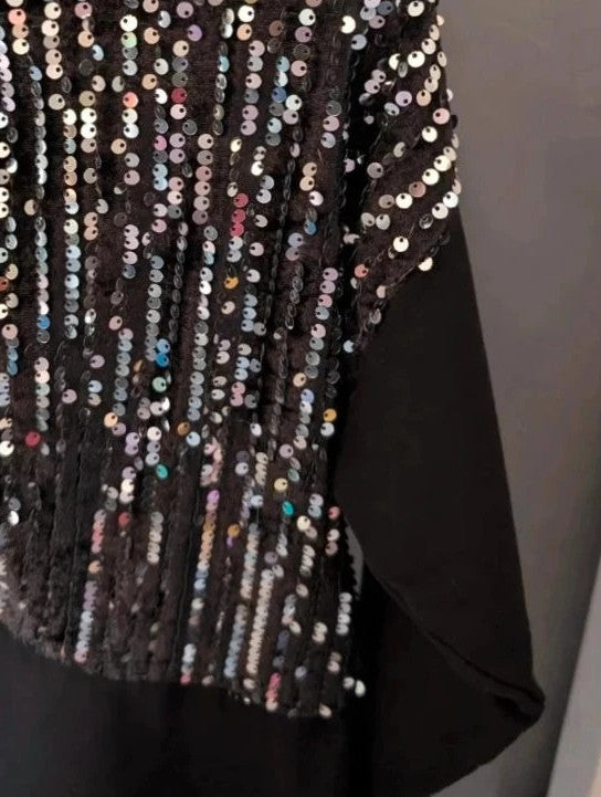 New Collection black tunic dress with silver sequin panels and relaxed crew neckline.