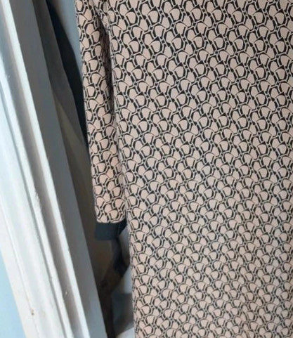 If Yoou beige tunic dress with black geometric print and split Mandarin collar.