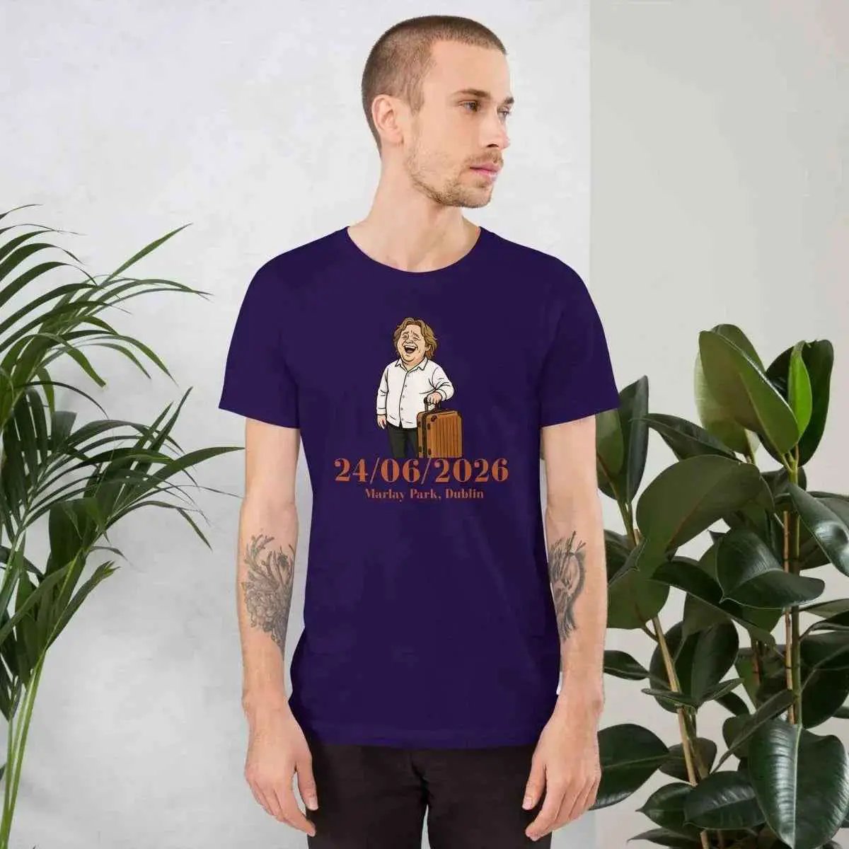 Purple unisex tour T-shirt with front cartoon graphic and 24/06/2026 print