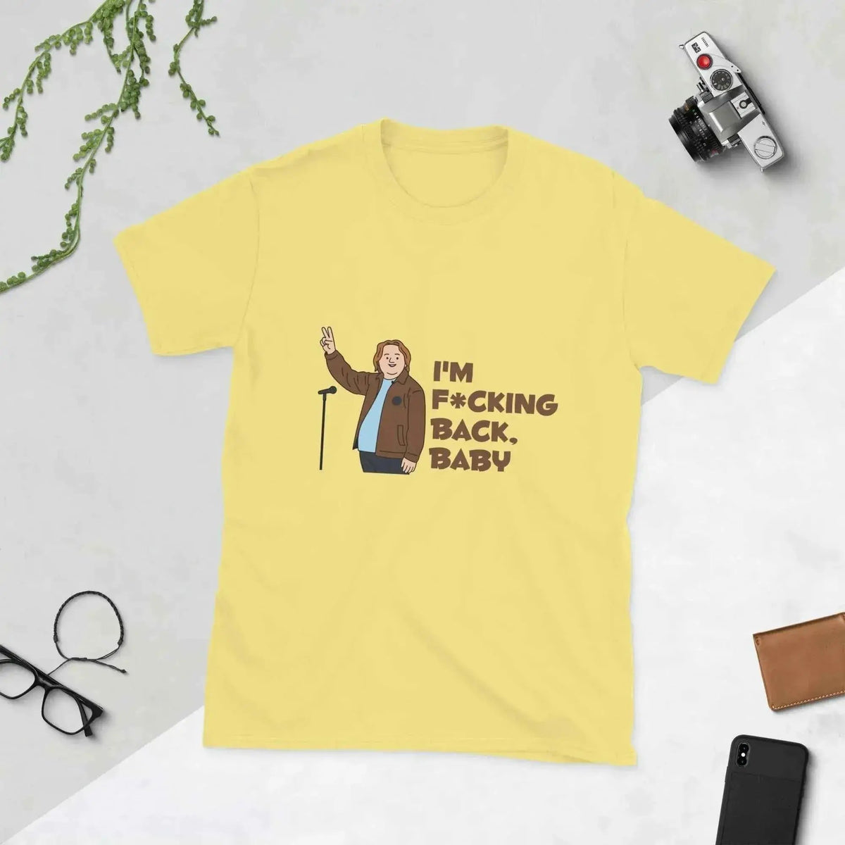 Unisex graphic cotton T-shirt in yellow, front text "I'm f*cking back, baby".
