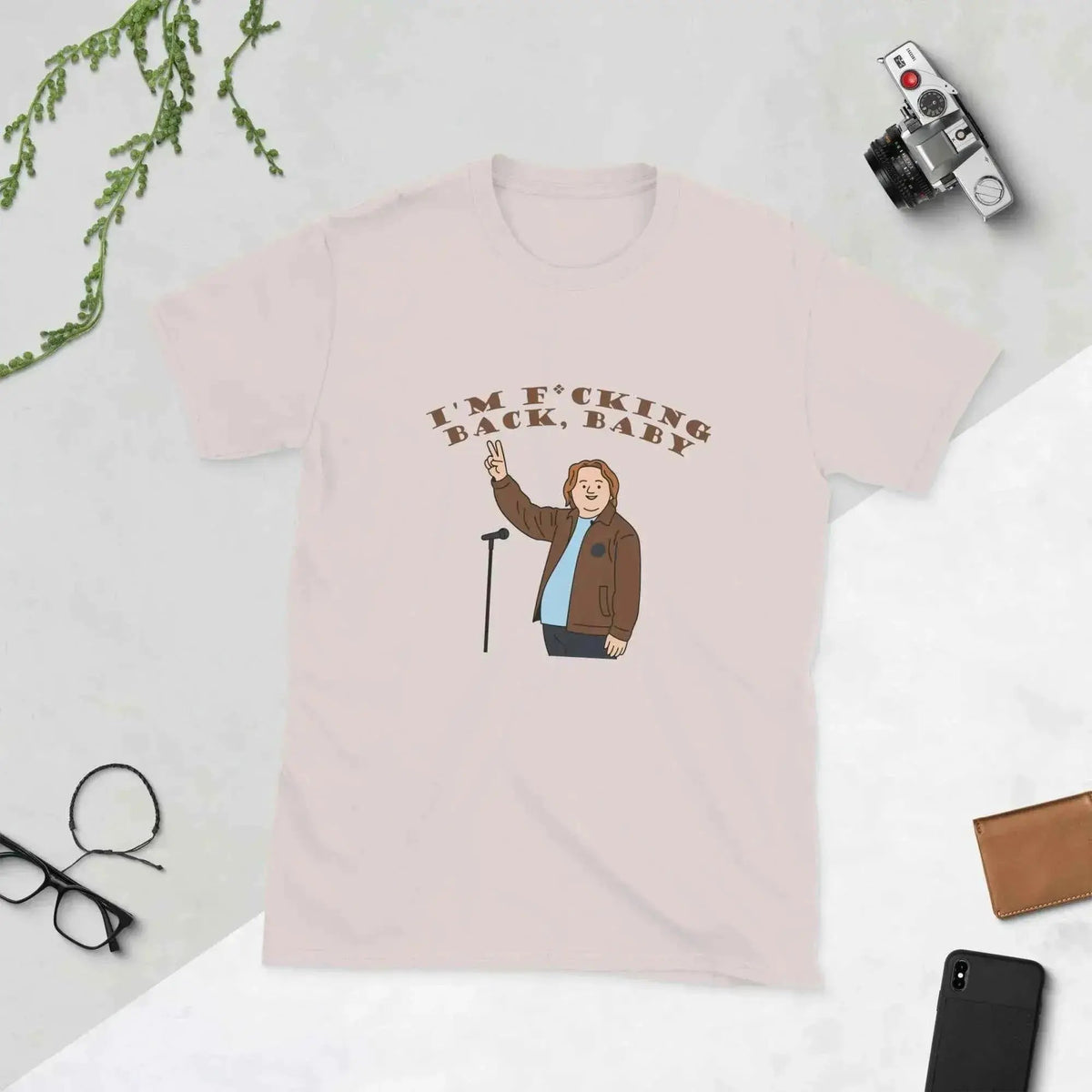 Unisex graphic cotton T-shirt in pale pink with front cartoon text and figure print