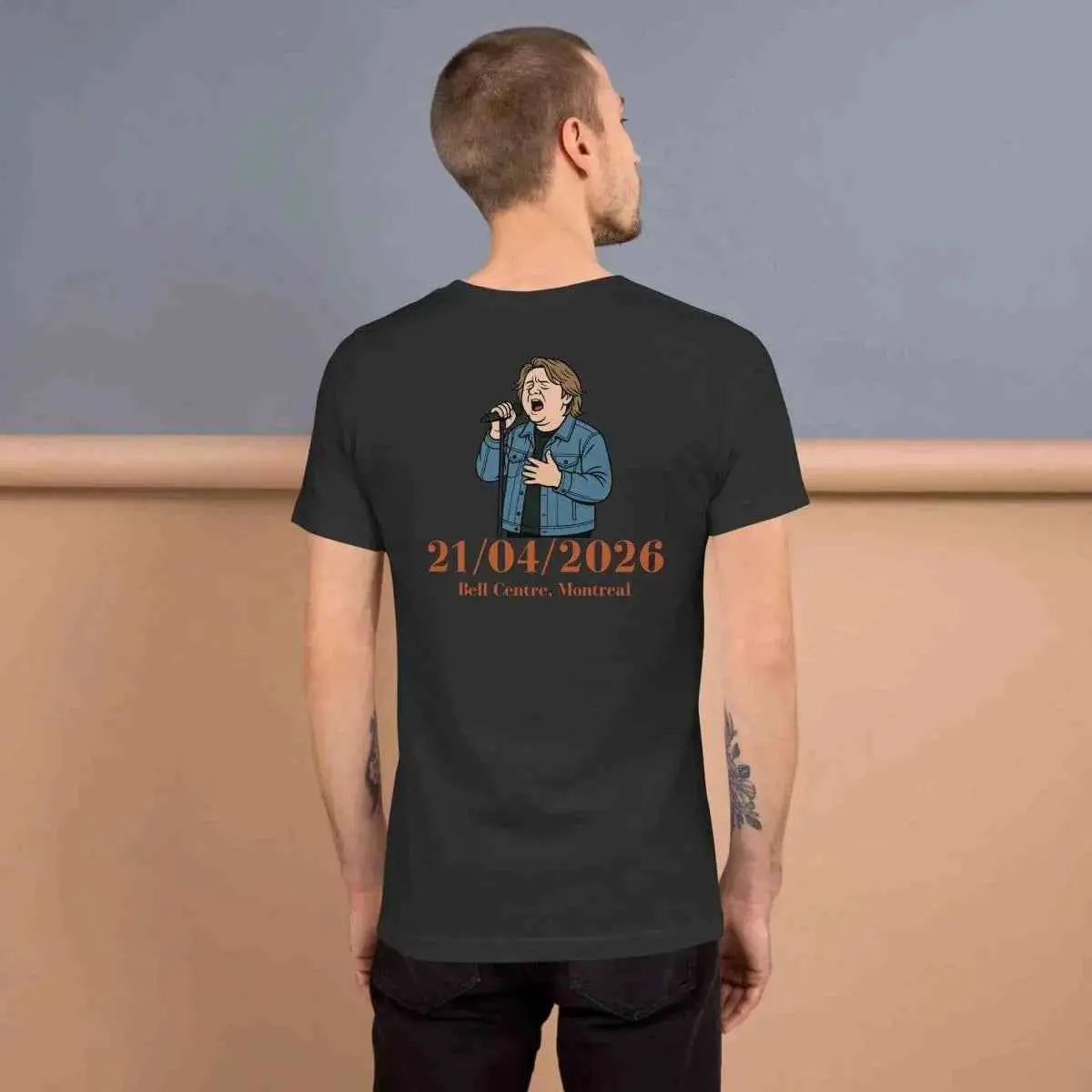 Black graphic concert T-shirt, back view with date text and microphone character