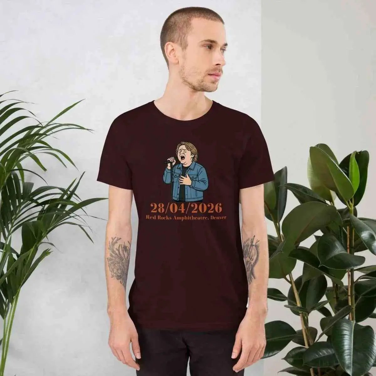Unisex burgundy crewneck t-shirt with front concert date graphic