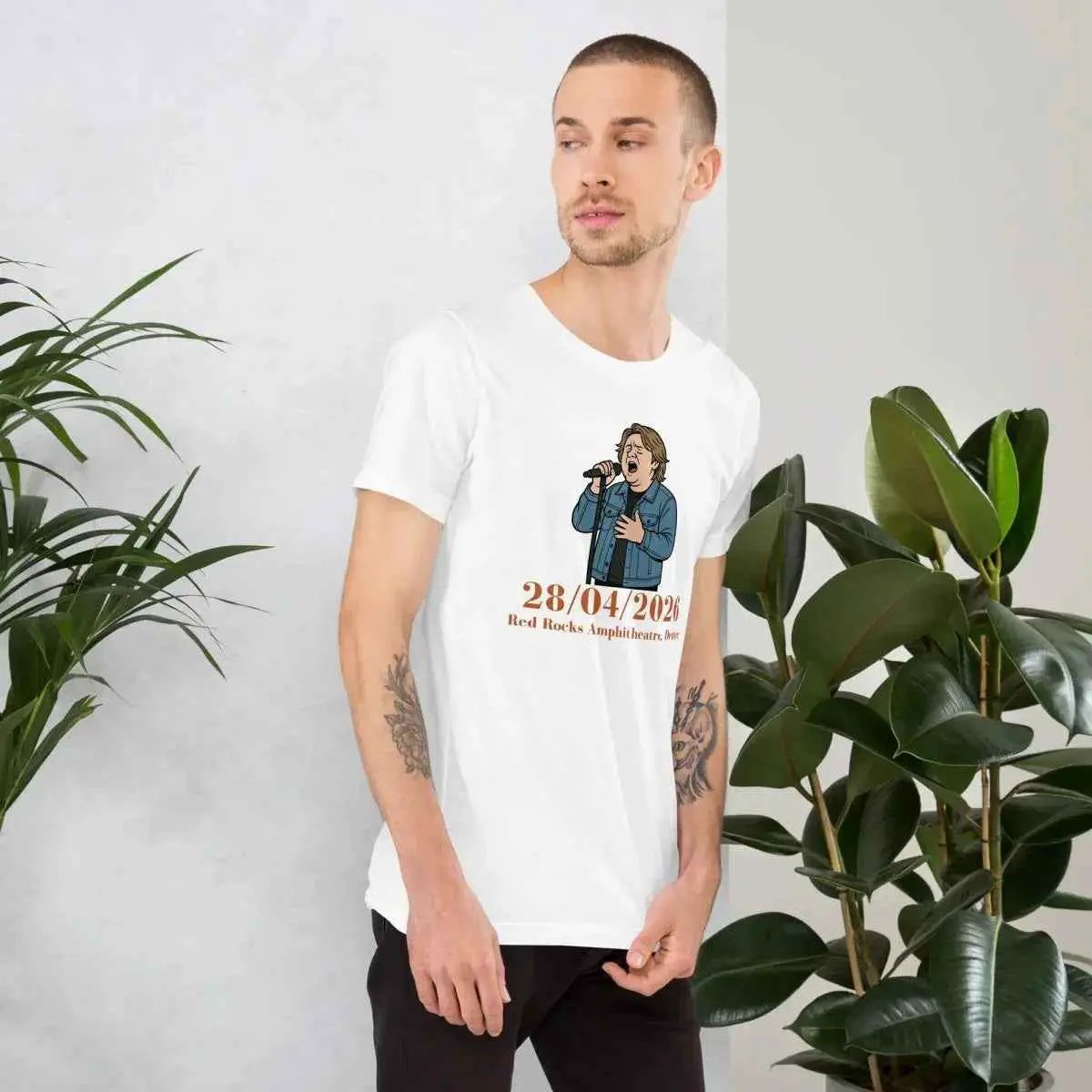 White unisex T-shirt with front graphic of singer and orange 28/04/2026 text