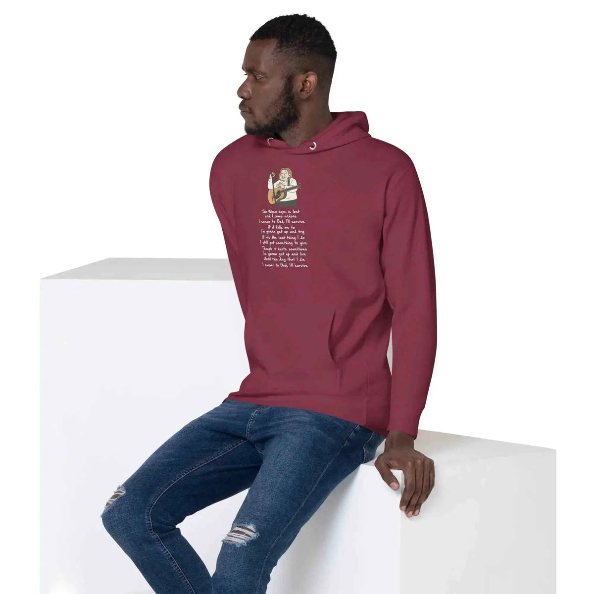 Maroon unisex pullover hoodie, side view with hood and front lyrics graphic