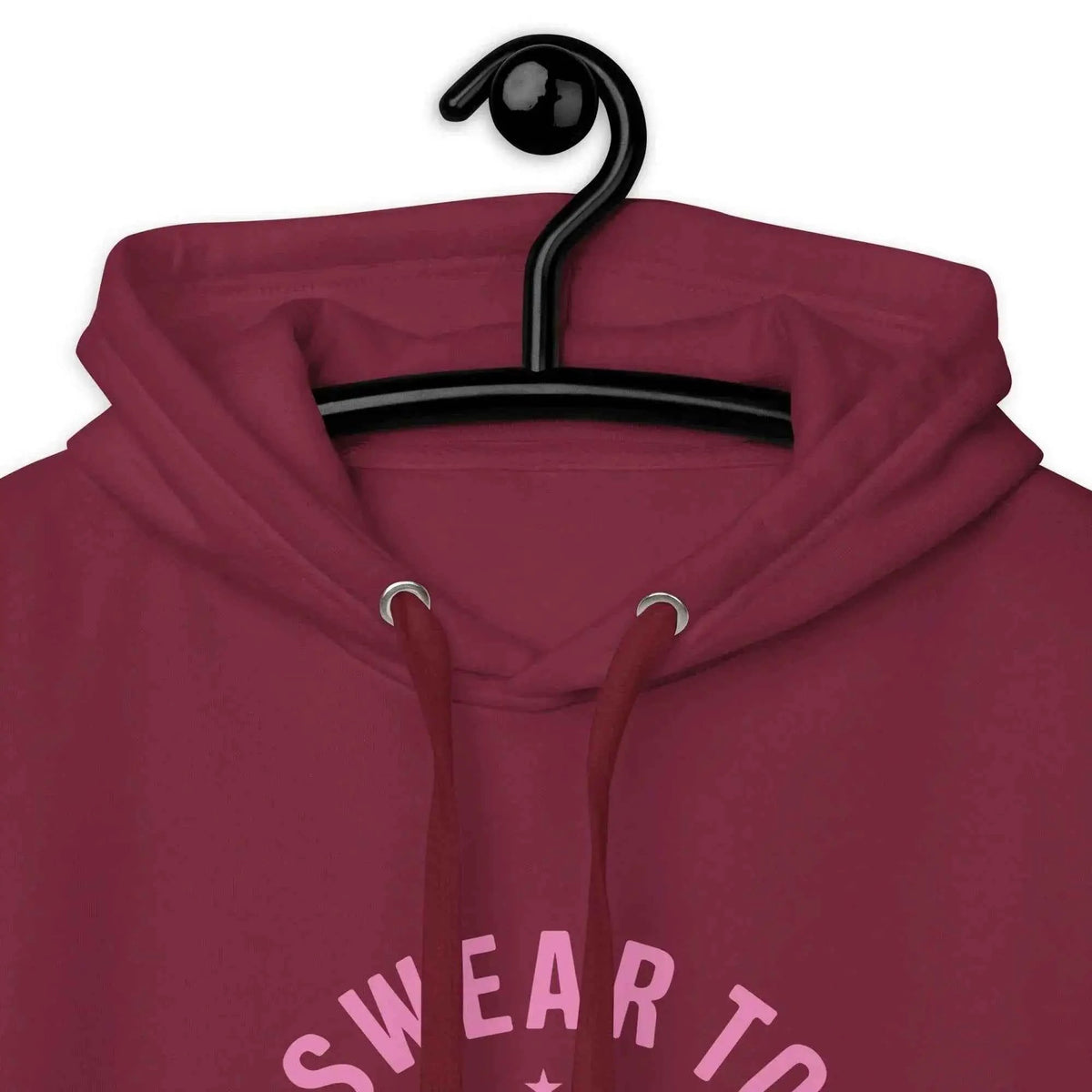 Maroon hoodie close-up with hood drawstrings and pink “Swear to God, I’ll Survive” graphic
