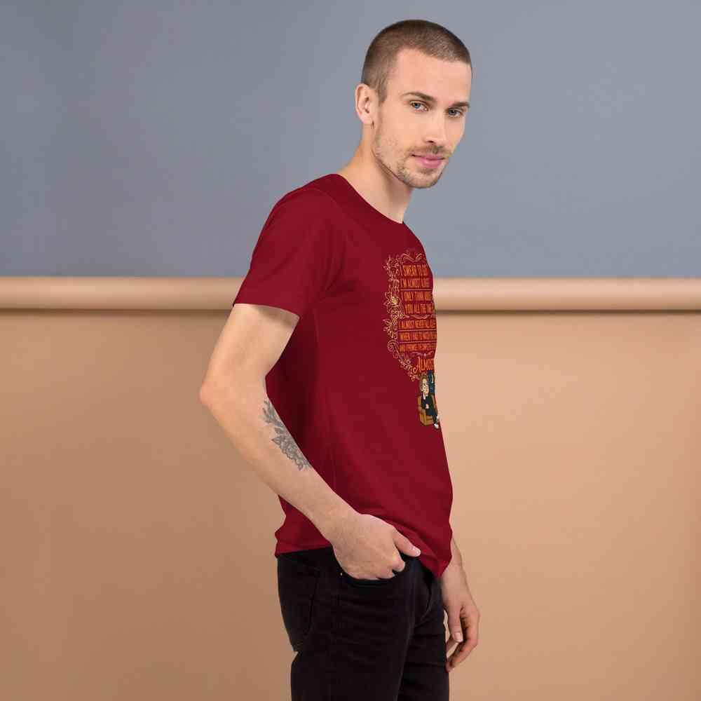 Man wearing maroon Lewis Capaldi merchandise t-shirt with song lyrics and graphic design