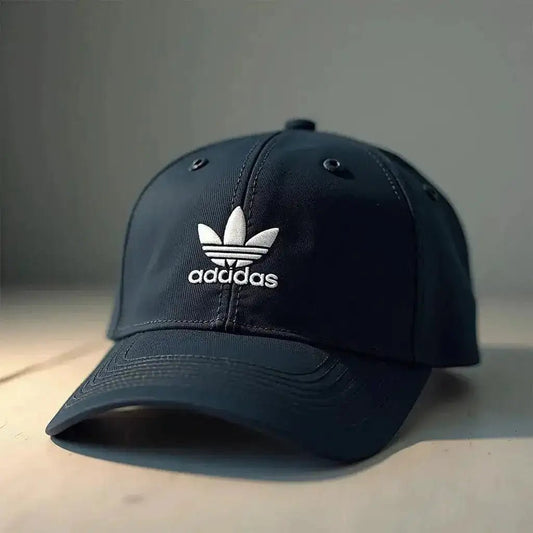 How to Select the Ideal Embroidered Logo Caps for Branding with a navy Adidas cap featuring logo.