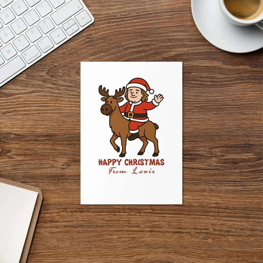 Happy Christmas greeting card featuring a cartoon of Santa and a reindeer with a festive message from Lewis.