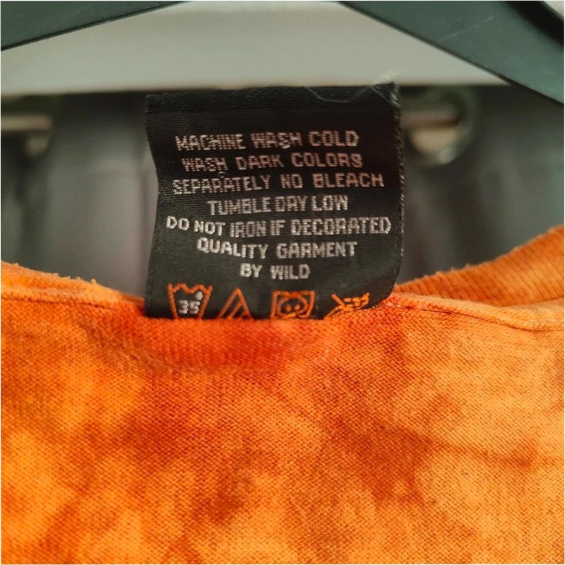 Wild orange and pink tie-dye graphic tee featuring double-sided Grim Reaper print.