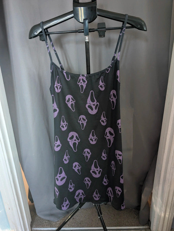 SHEIN black and purple cami slip dress with Ghostface mask pattern and adjustable straps.