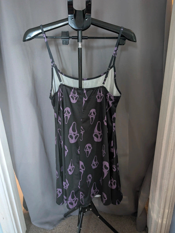 SHEIN black and purple cami slip dress with Ghostface mask pattern and adjustable straps.