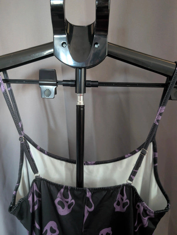 SHEIN black and purple cami slip dress with Ghostface mask pattern and adjustable straps.