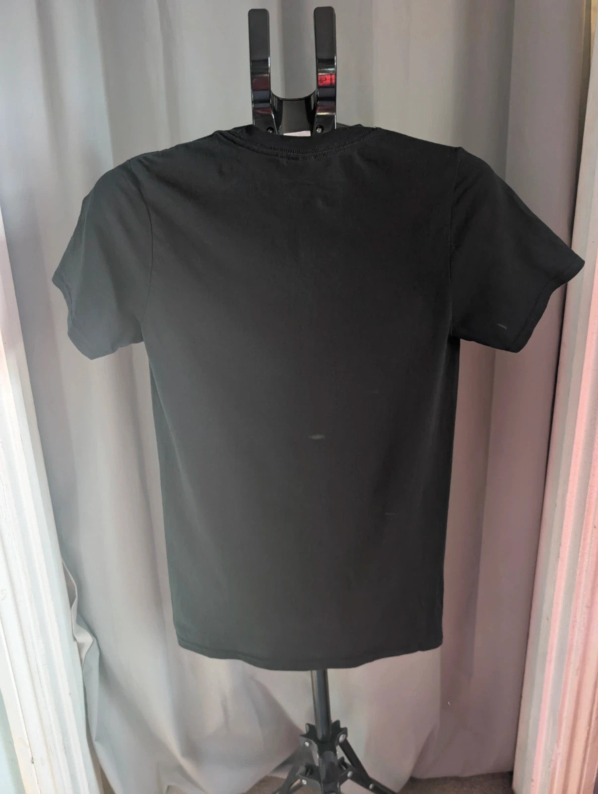 Gildan black pocket t-shirt with Foo Fighters "Run For Your Life" graphic and vibrant colors.