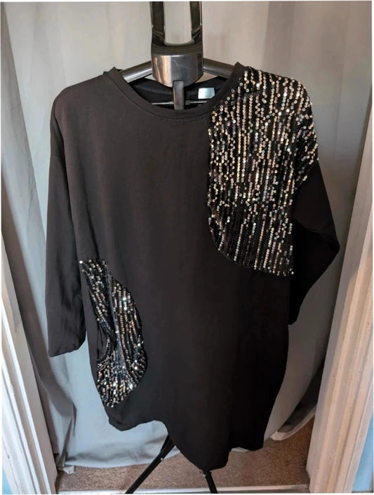 New Collection black tunic dress with silver sequin panels and relaxed crew neckline.