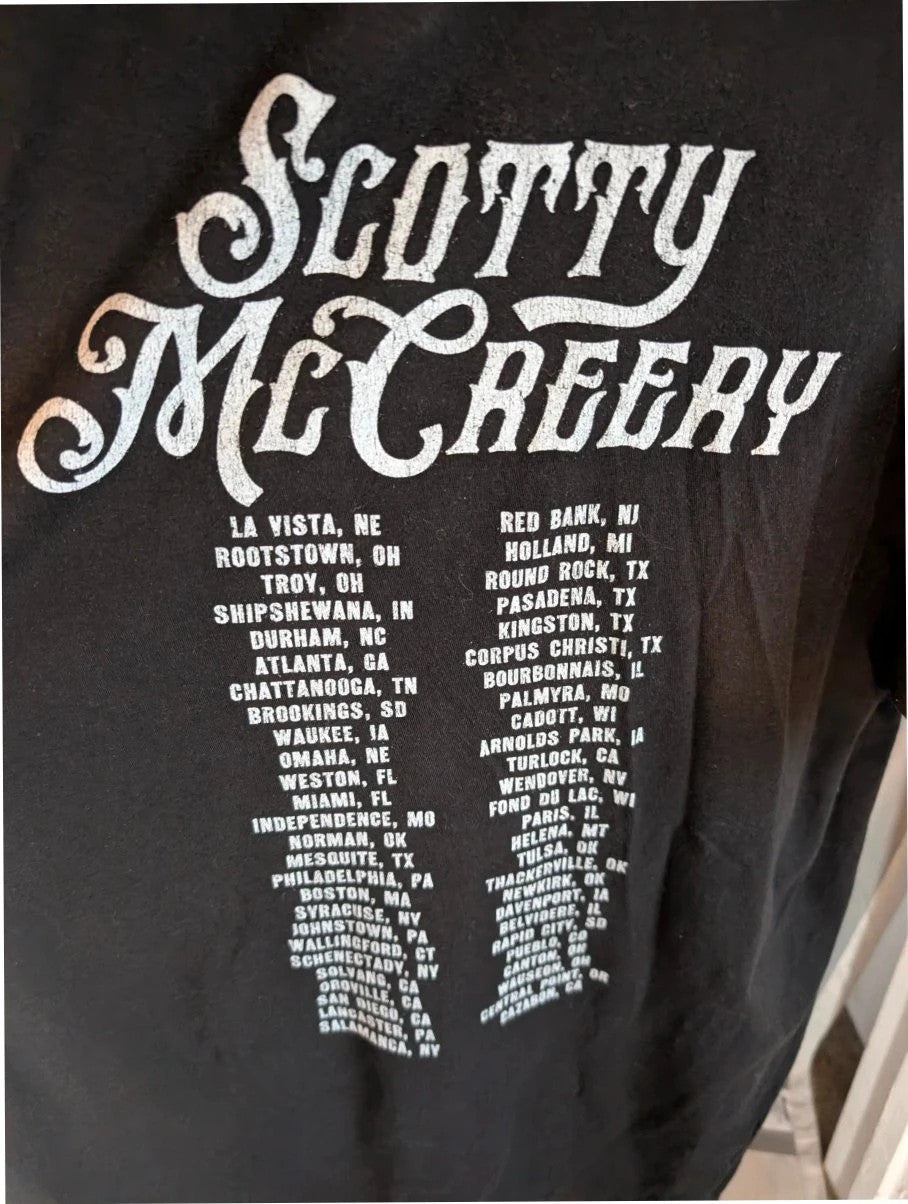 Scotty McCreery black graphic tee with retro truck artwork and tour dates on back.