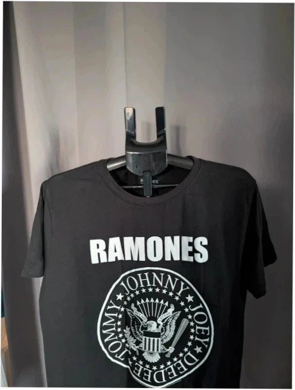 Ramones black graphic t-shirt featuring eagle logo and band member names in white.