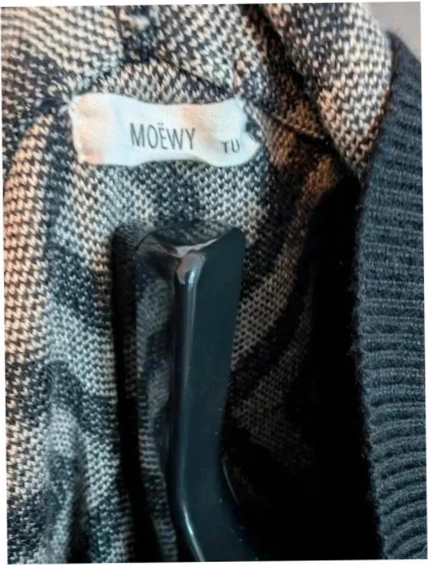 Moewy black cream geometric knit hooded jumper dress with drawstring hood and ribbed cuffs.