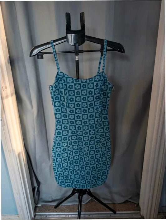 H&M blue floral checkered denim cami mini dress with fitted silhouette and thin straps.