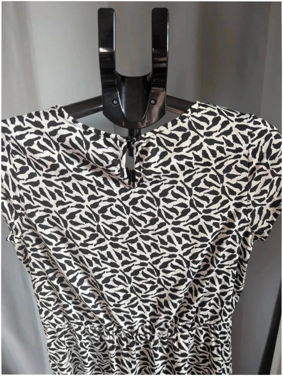 New Look black and white bird print mini dress with lace Peter Pan collar.