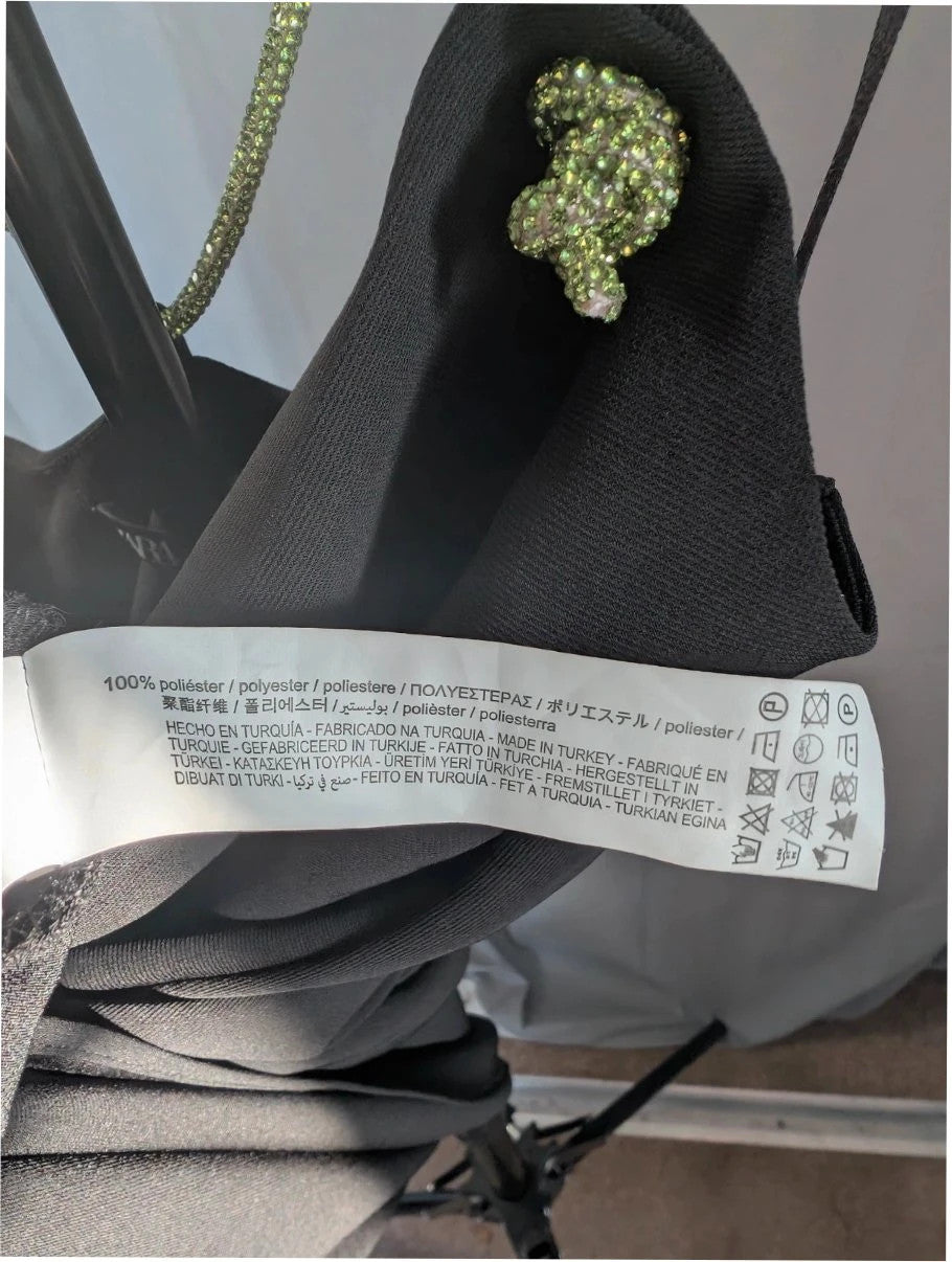 Zara black cowl neck slip dress with lime green rhinestone straps and smooth polyester fabric.