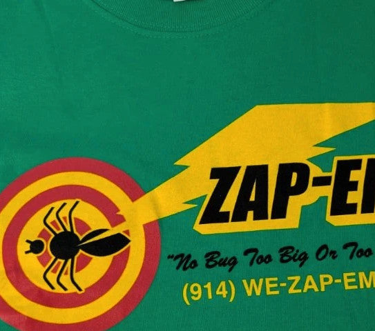 Gildan green graphic tee featuring Men In Black "Zap-Em Exterminators" logo and slogan.