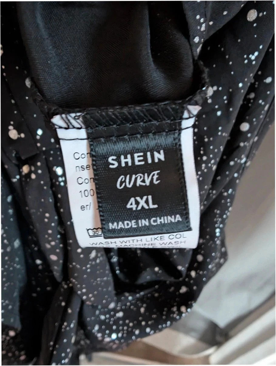 Shein Curve black cold shoulder blouse with silver shimmer, V-neckline and flutter sleeves.