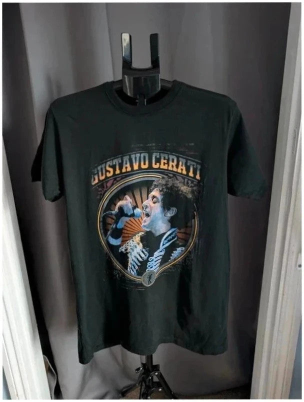 Gustavo Cerati black graphic t-shirt with vibrant print and white lettering, 100% cotton.