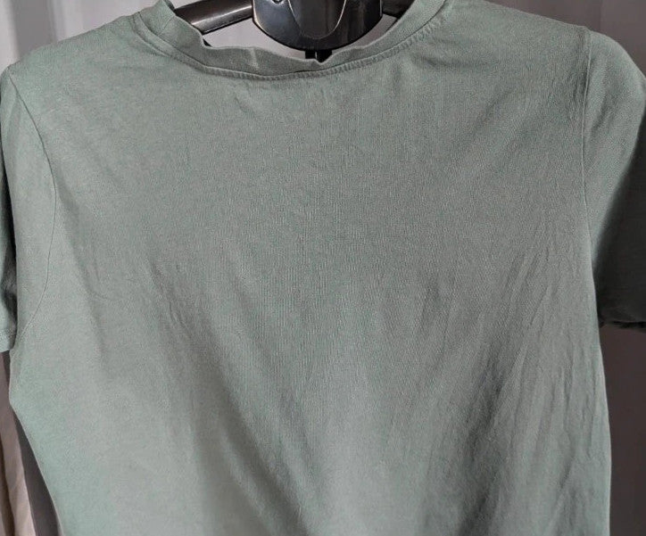Primark green graphic t-shirt with distressed "SOHO New York City" print and ribbed neckline.