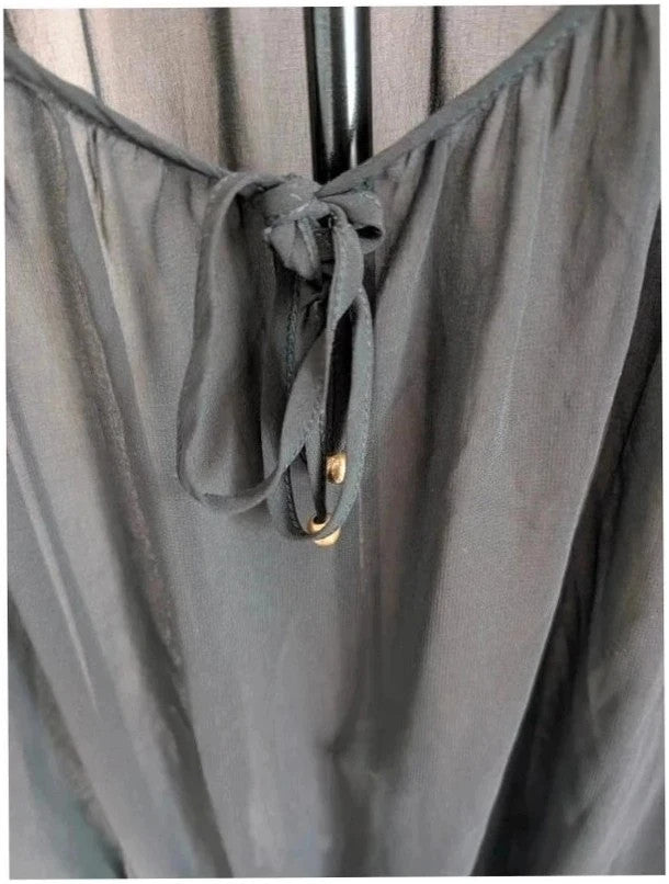 Next black sheer long sleeve blouse with tie neck and ruffle hem detail.
