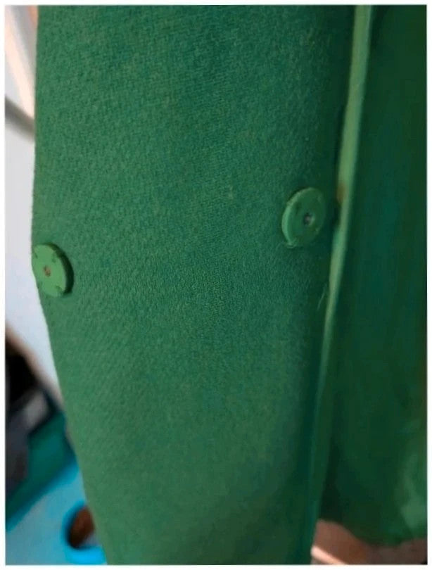 H&M green longline coat with structured shoulders and notch lapel collar.