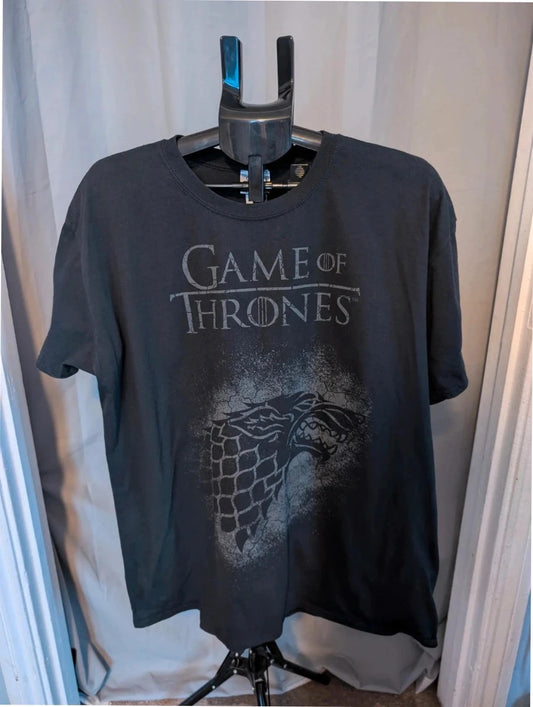 Game of Thrones black graphic tee featuring distressed House Stark direwolf sigil and logo.