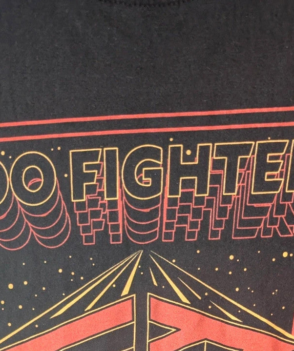 Gildan black pocket t-shirt with Foo Fighters "Run For Your Life" graphic and vibrant colors.
