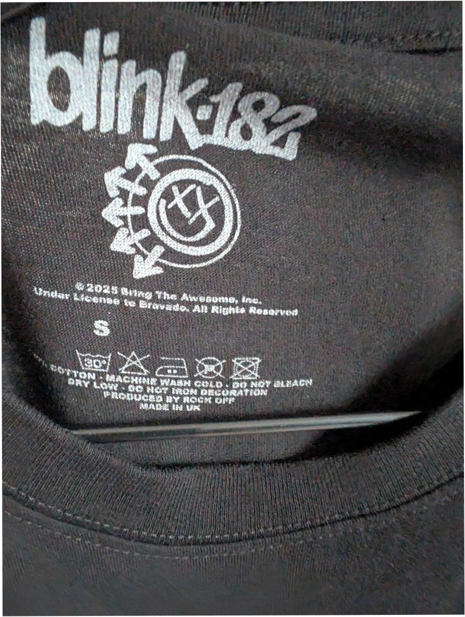 Blink 182 black graphic tee with blue skeleton middle finger design and crew neck.