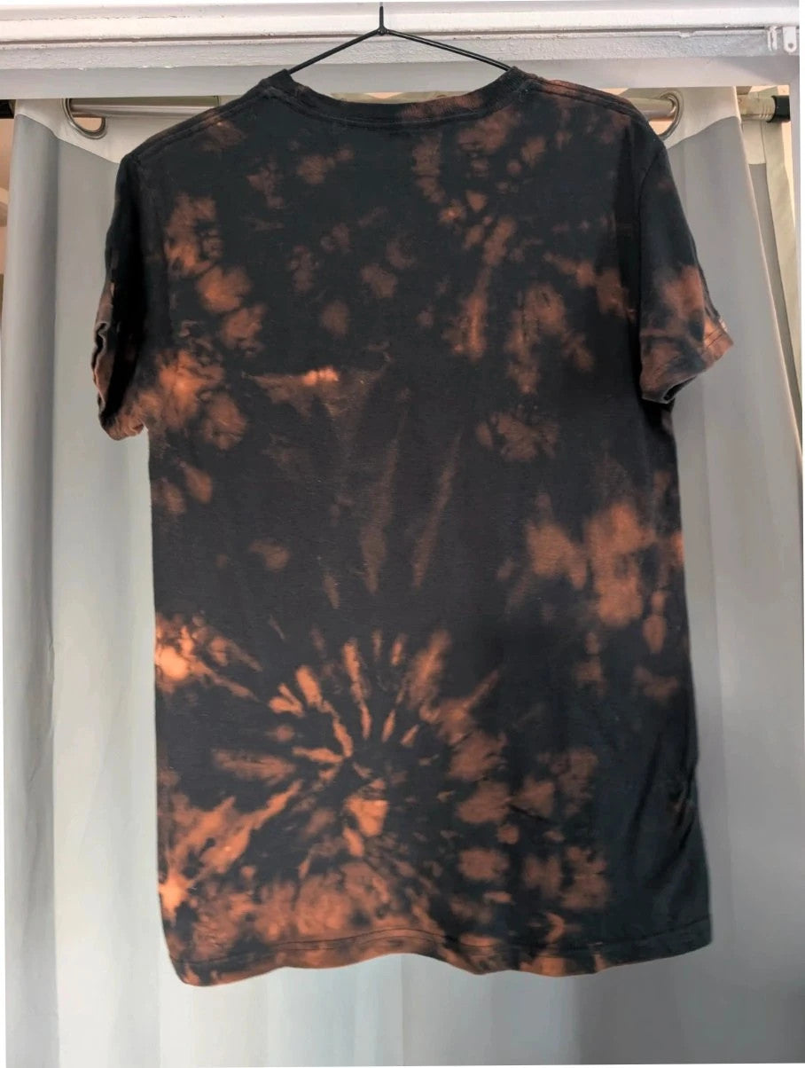 Hendrix graphic tee black bleach tie dye featuring vibrant Jimi Hendrix guitar design.