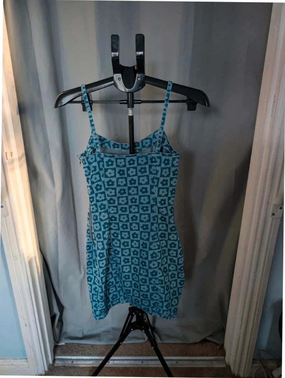 H&M blue floral checkered denim cami mini dress with fitted silhouette and thin straps.