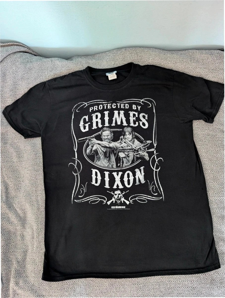 The Walking Dead black graphic tee featuring Rick Grimes and Daryl Dixon print.