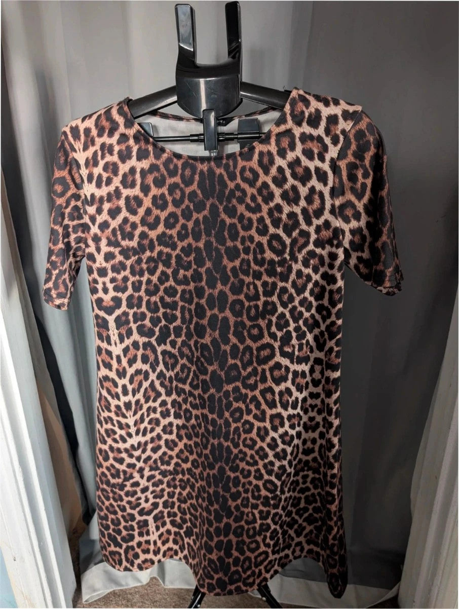 Peacocks leopard print shift mini dress in black and brown with short sleeves and scoop neckline.
