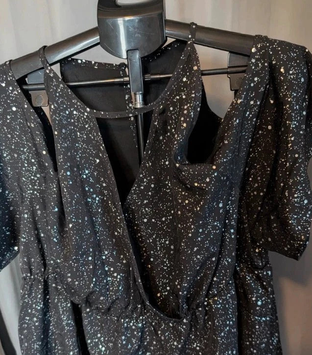 Shein Curve black cold shoulder blouse with silver shimmer, V-neckline and flutter sleeves.