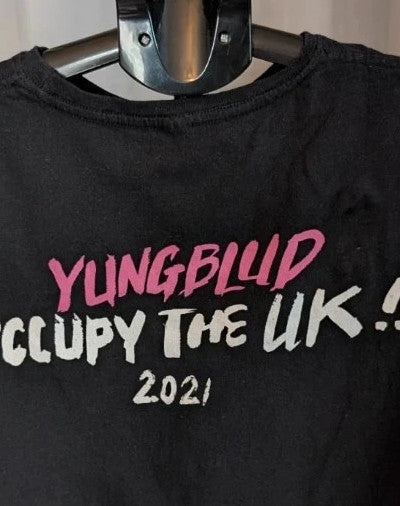 Yungblud black graphic tee with metallic silver portrait and neon pink tour lettering.