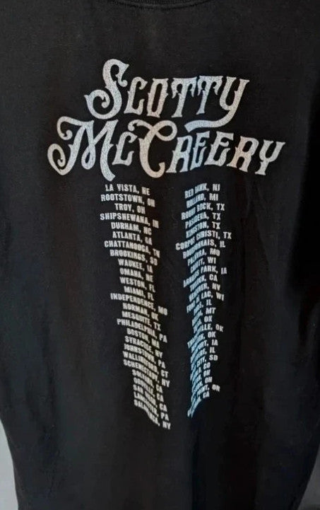 Scotty McCreery black graphic tee featuring retro artwork and US tour dates on back.