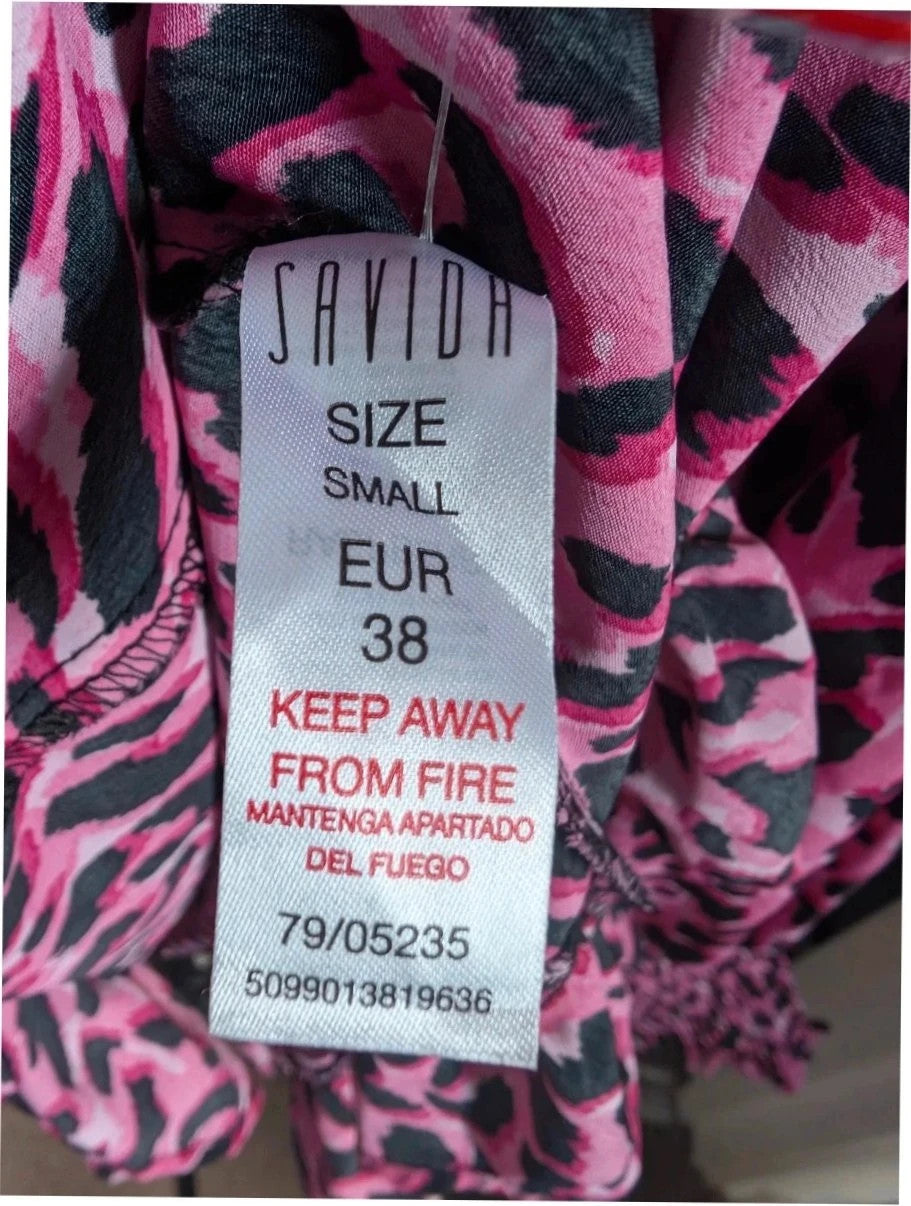Savida pink and black leopard print mini dress with ruffle details and frill neckline.