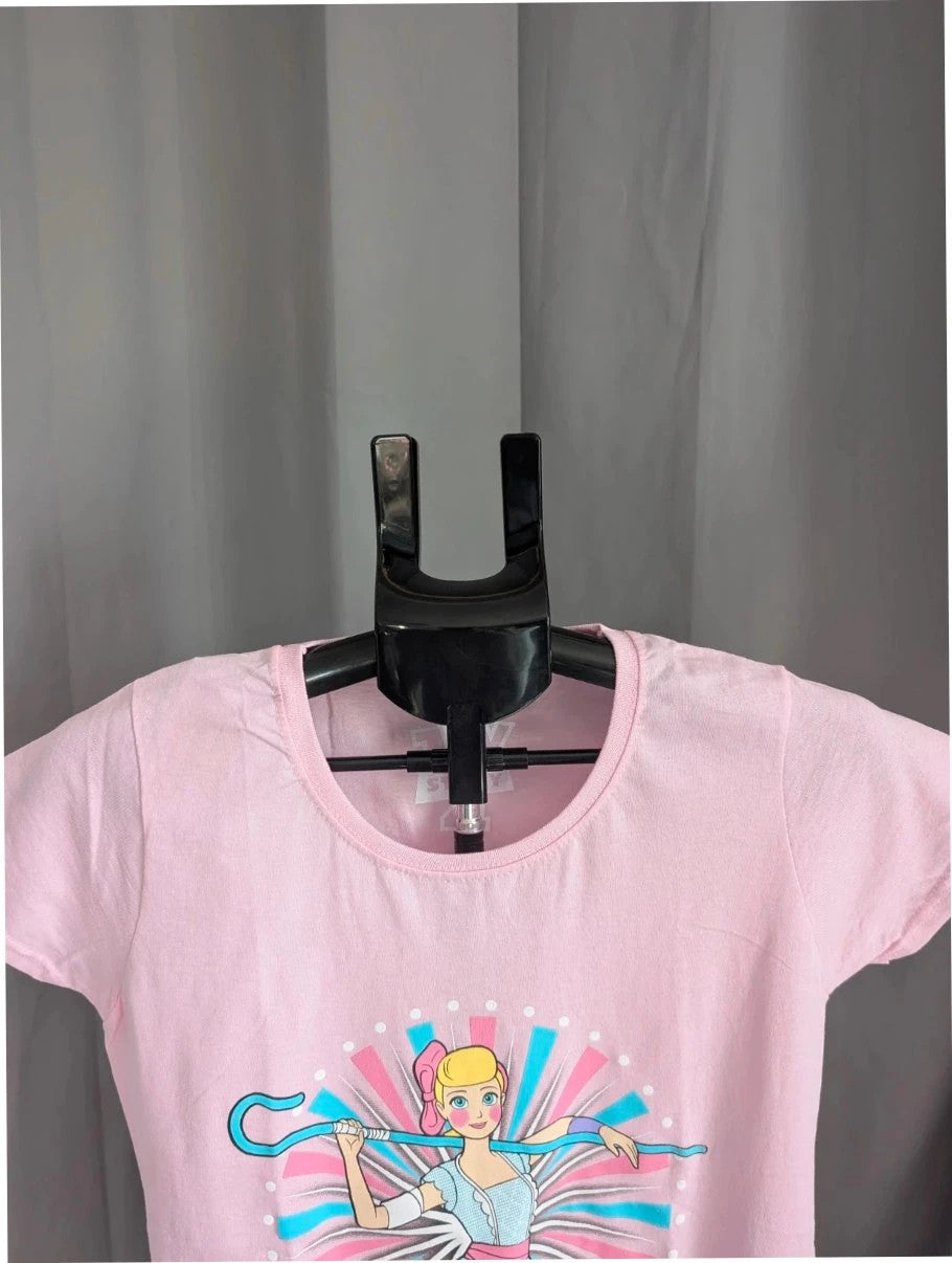 Disney pink graphic t-shirt featuring Bo Peep and "Fight Like A Girl!" text.