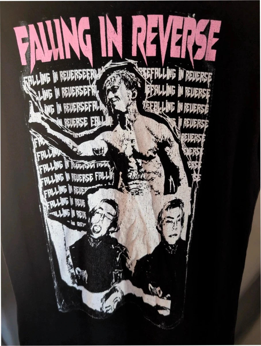 Next Level black graphic tee featuring pink Falling In Reverse logo and band portrait.