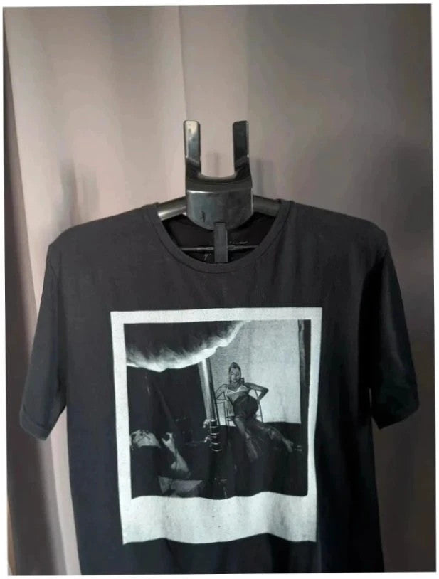 Dua Lipa black graphic tee with front polaroid print and back tour dates list.
