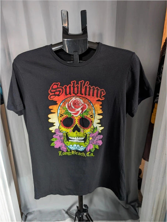 Sublime black graphic tee featuring vibrant sugar skull print, red rose, and gothic lettering.