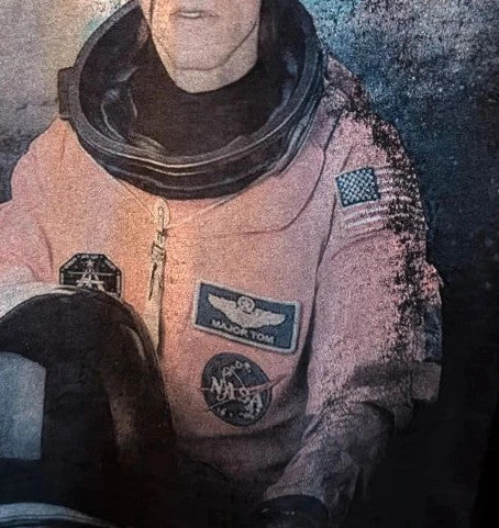 LaBarNa black graphic t-shirt featuring Ziggy Stardust lightning bolt astronaut print.
