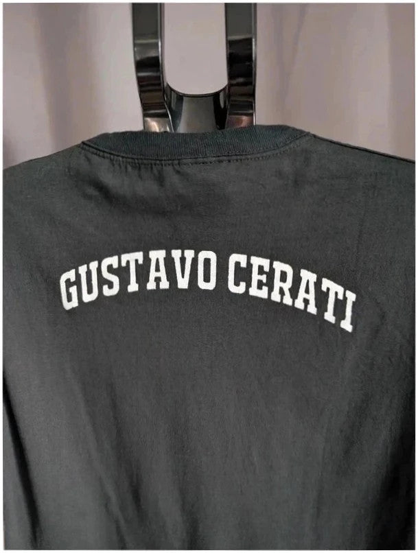 Gustavo Cerati black graphic t-shirt with vibrant print and white lettering, 100% cotton.