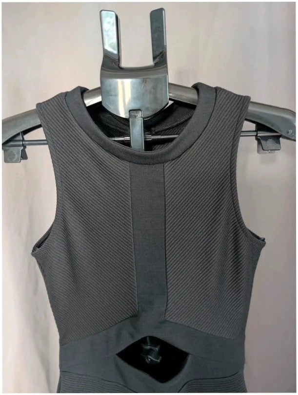 River Island black bodycon mini dress with ribbed texture and midriff cut-out detail.