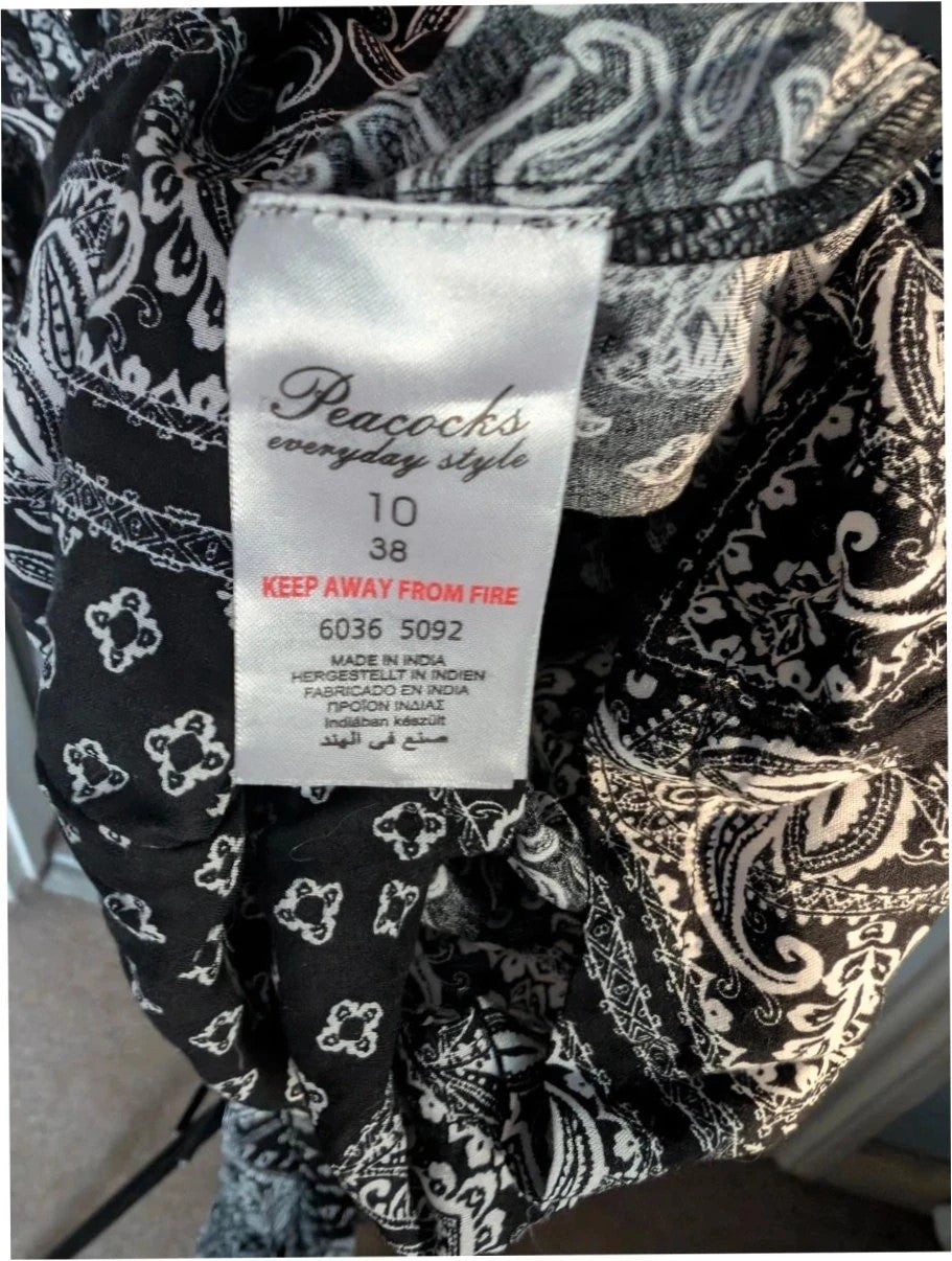 Peacocks black and white paisley strapless bandeau jumpsuit in lightweight viscose fabric.
